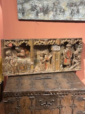 GOTHIC POLYCHROMED AND CARVED PREDELLA DEPICTING THE LIFE OF SAINT BENEDICT OF NURSIA